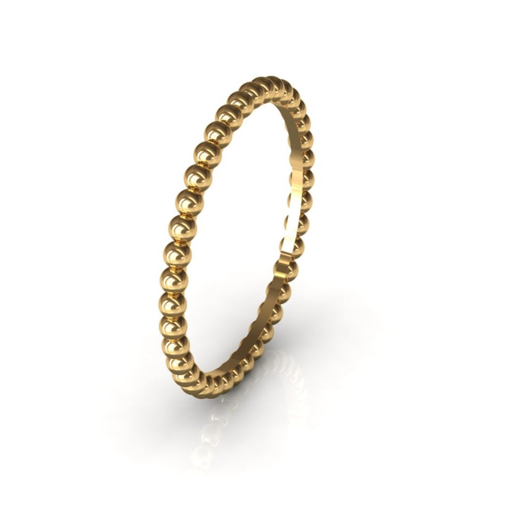 Parlé gold bead stacking ring, close-up front view
