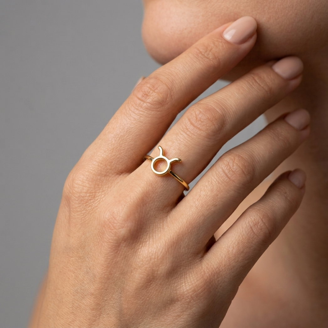Close-up of Taurus zodiac engraving on gold ring - Starsky XII by Vampa Amsterdam