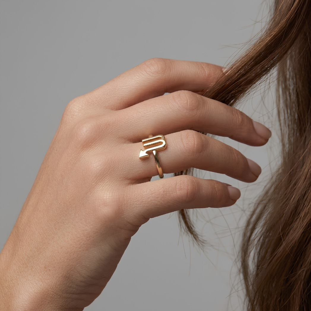 Gold Scorpio Ring from the Starsky XII collection styled on multiple fingers of a model – modern gold Scorpio jewelry look