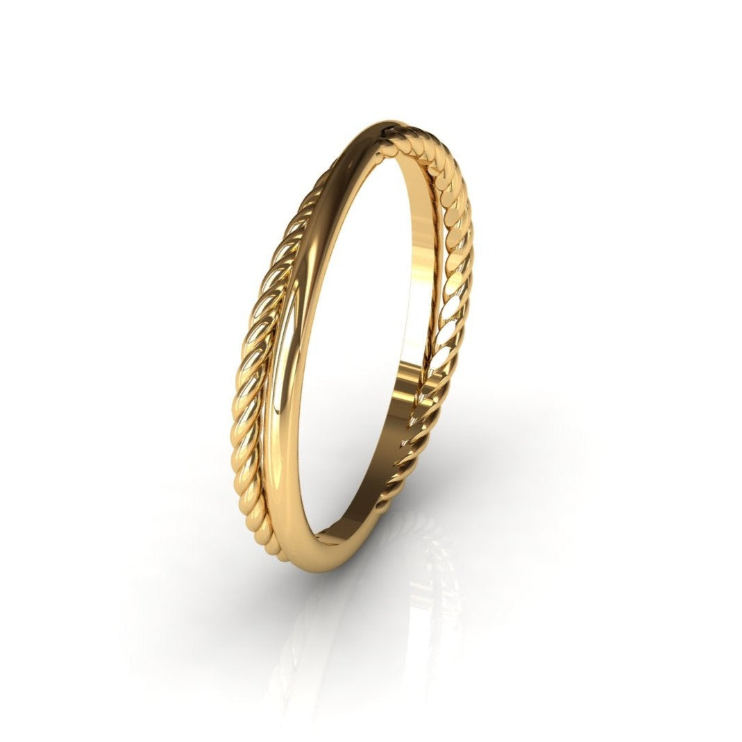 the Royal Embrace Ring, a stunning jewelry piece featuring two intricately intertwined bands - a classic gold band and a trendy rope band.